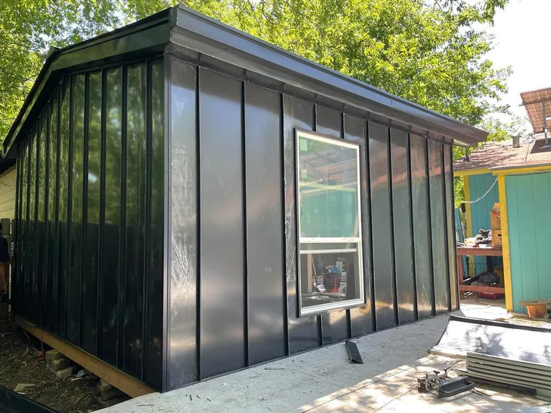 Black standing seam metal wall panels for Metal Roof Installation in St. Marys